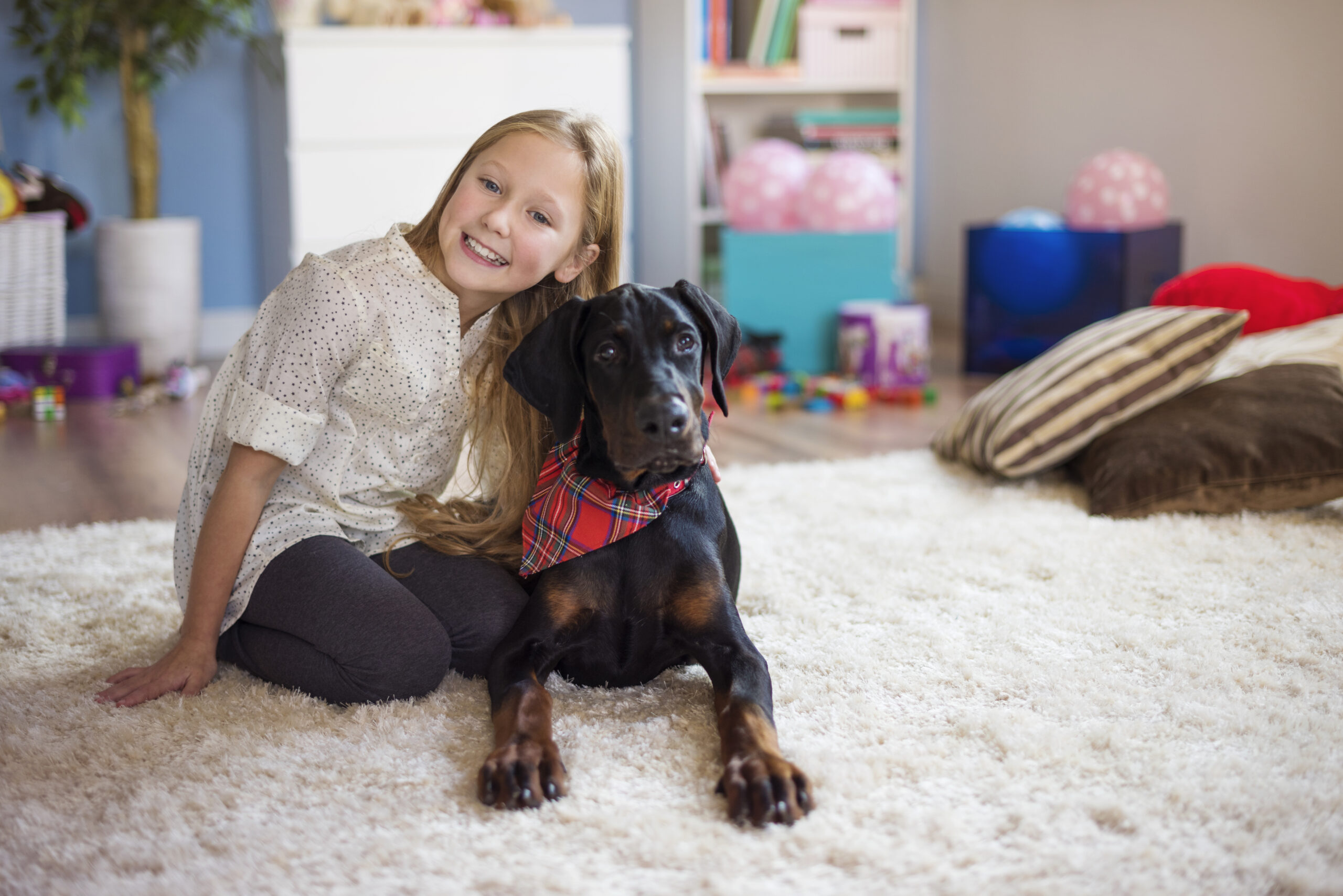 Cute girl posing with her cute pet